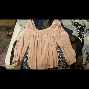 Over the shoulder, long sleeve, loose blouse .